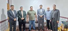 حضور سرپرست بنیاد شهید و امور ایثارگران خوزستان در شهرستان گتوند و دیدار با خانواده قهرمان پاراوزنه برداری